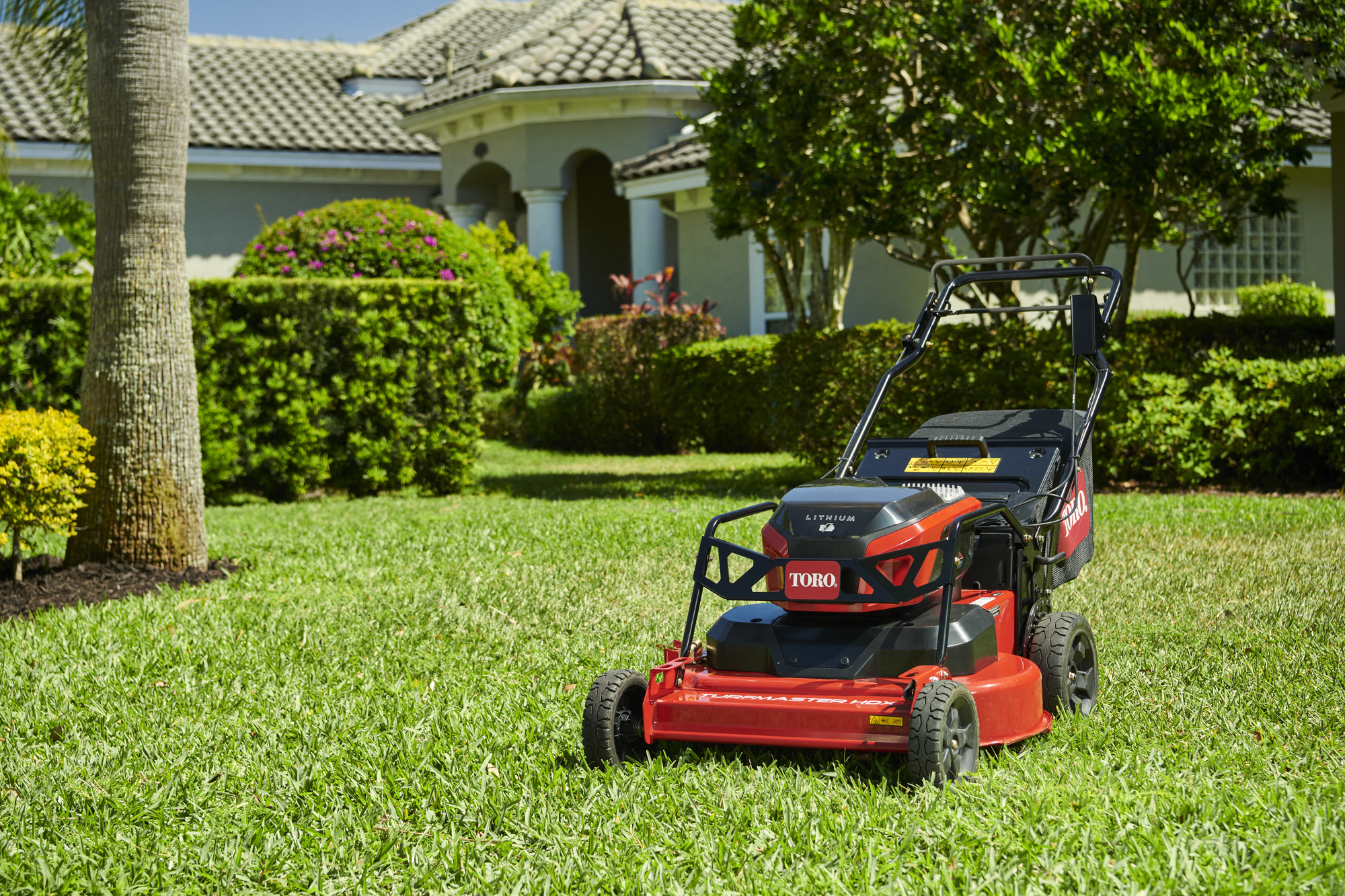 One of the toro mowers on a lush green lawn